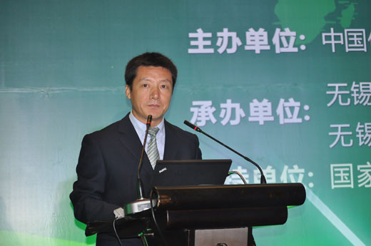 图为致明德公司副总裁赵国林代表集团公司做相关报告